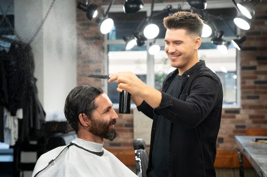 Stylish gentleman enjoying a grooming session at one of Dubai's top men's salons