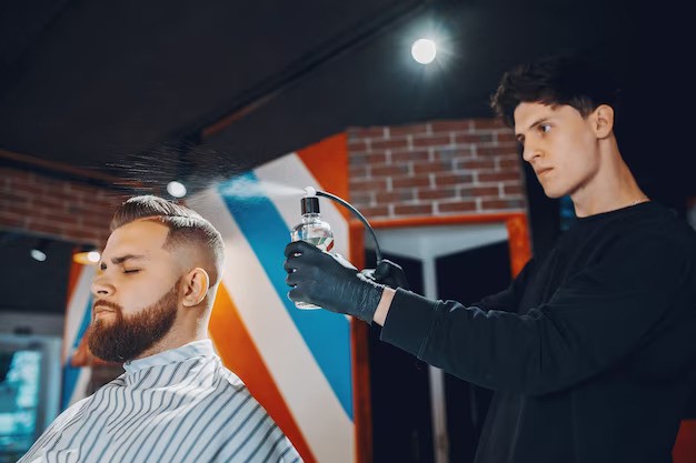 Professional hairstylist providing at a men's grooming salon