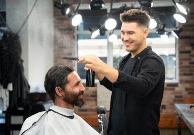 Stylish gentleman enjoying a grooming session at one of Dubai's top men's salons